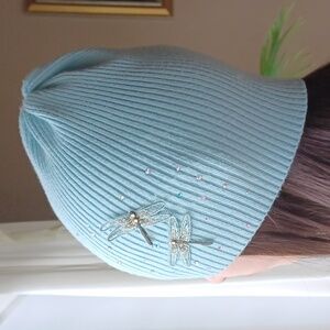 NWOT Light Blue hat for girls size 7-13 years old.